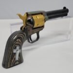 Black rosewood grips with white pearl acrylic cross and checkering for .22 and .22 Magnum Heritage Arms Rough Rider