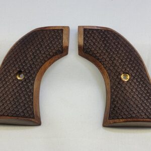 Colt Peacemaker
Walnut Grips with Carved Scales
