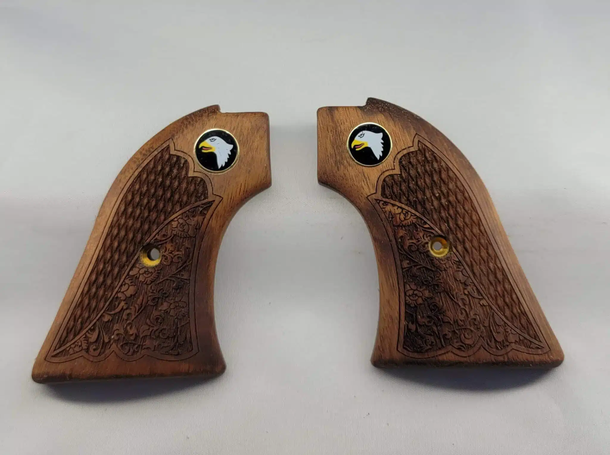 Heritage Rough Rider walnut grips with oakleaf checkering and Screaming Eagle medallion — CNC-fit for Heritage Arms .22 LR and .22 Magnum revolvers