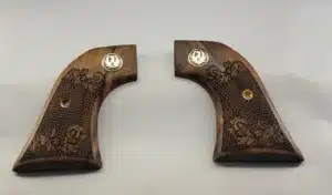 Ruger Wrangler walnut grips with laser-carved scrollwork and black Ruger medallion