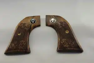 Ruger Wrangler walnut grips with laser-carved scrollwork and black Punisher medallion