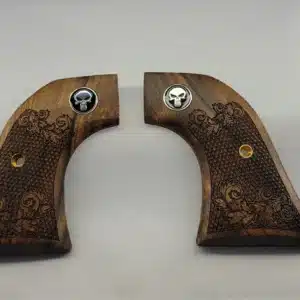 Ruger Wrangler walnut grips with laser-carved scrollwork and black Punisher medallion