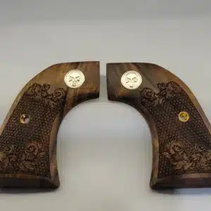 Ruger Wrangler walnut grips with laser-carved scrollwork and silver Punisher medallion