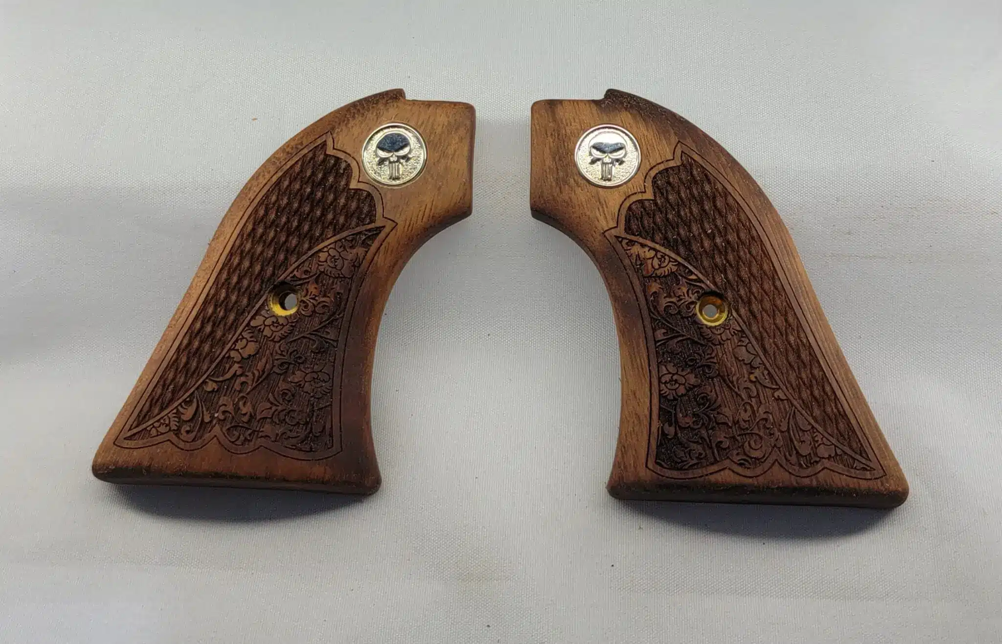 Heritage Rough Rider Punisher Grips — solid walnut with oakleaf checkering and Silver Punisher medallion for .22 LR and .22 Magnum